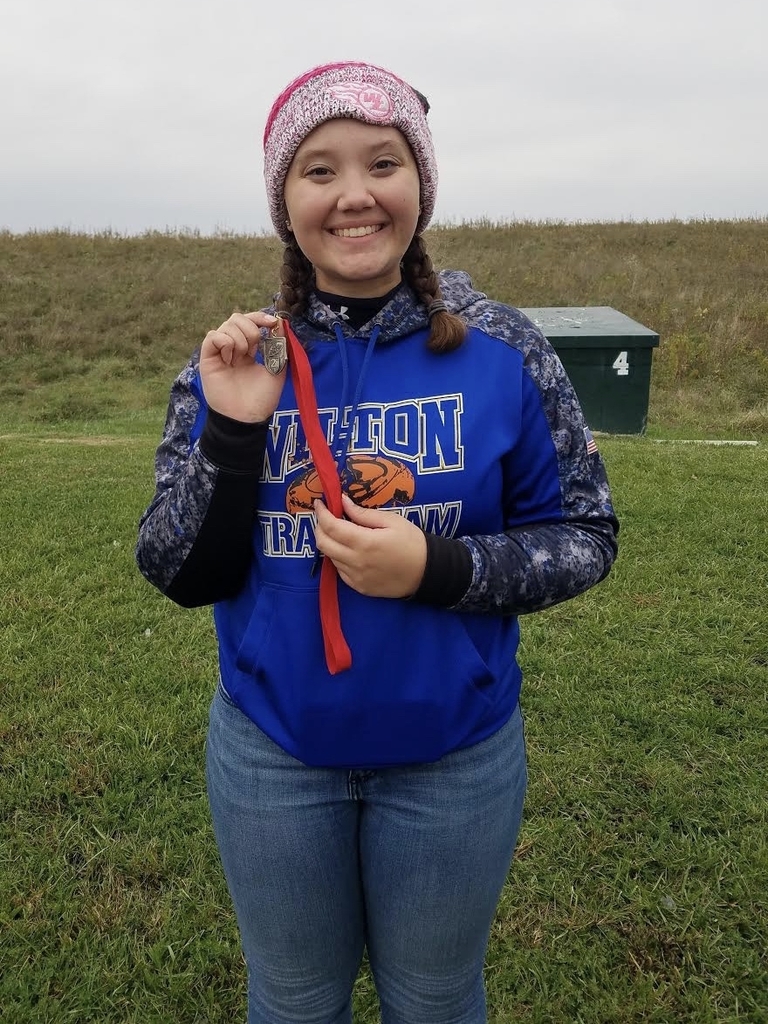 Morgan Hodge with her 2nd place trap medal in doubles for Varsity.  