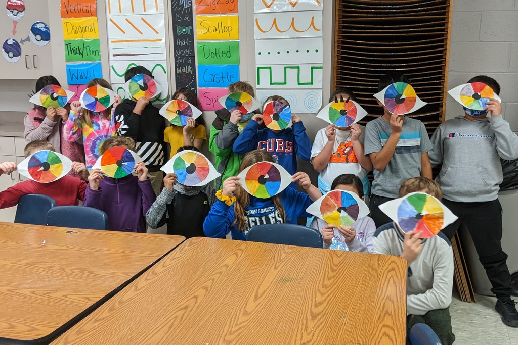 Mr. Perez's 3rd Grade Class with color wheel eyes