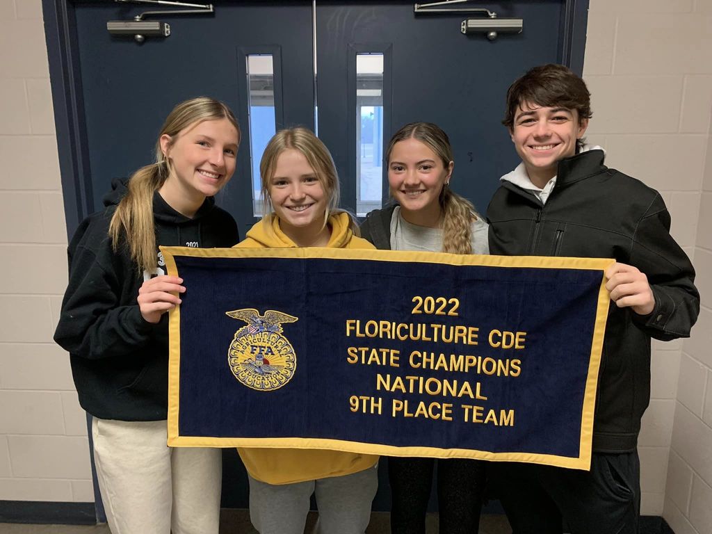 2022 Floriculture Team with their State Champions National 9th Place Team Banner