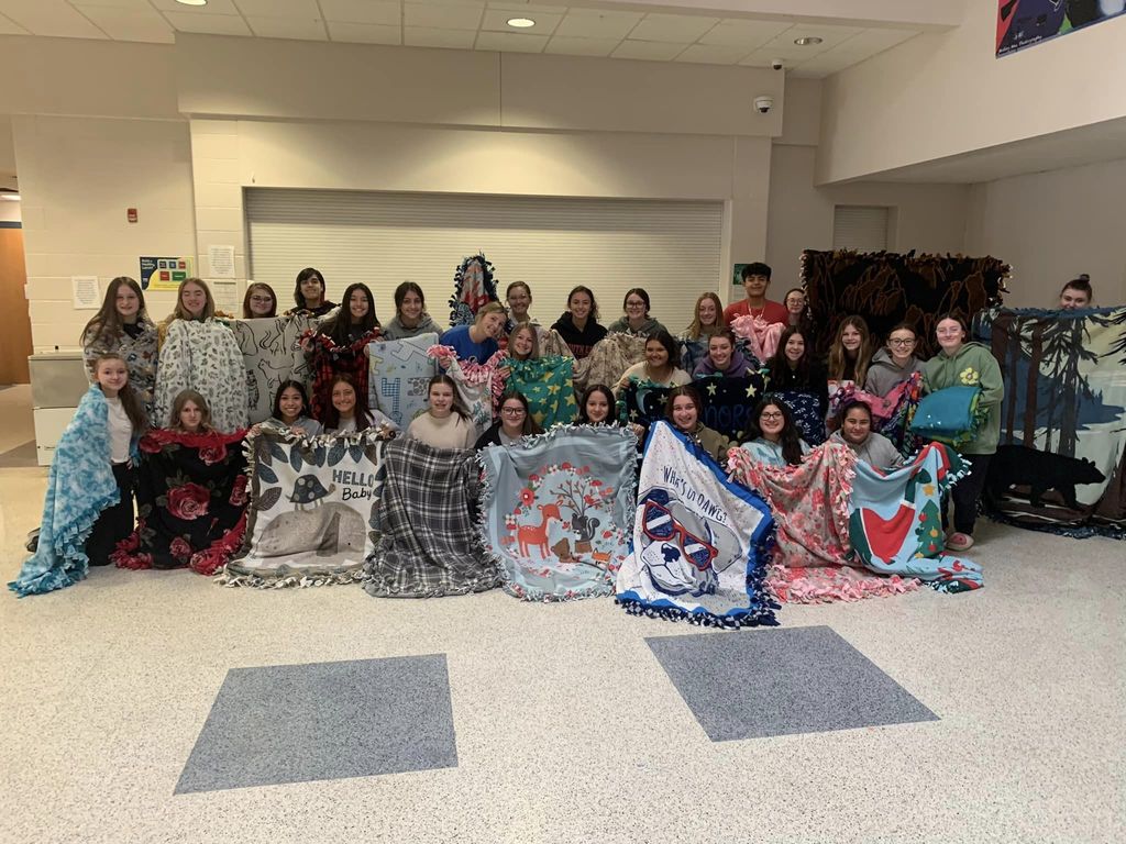 FFA group picture with their blankets for Cuddles for Kids