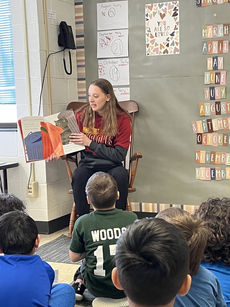 Kelsey Joens reads to a Kindergarten class