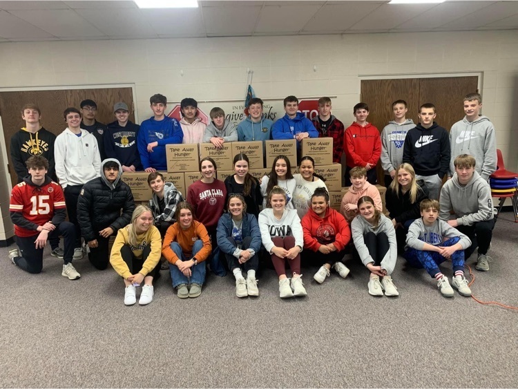 WL FFA and WL Boys Basketball with the meals they packaged